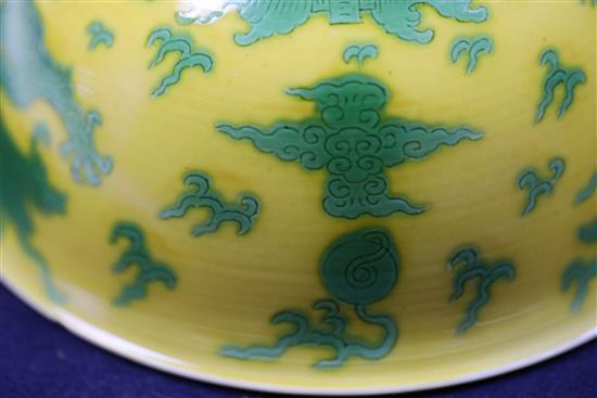A Chinese yellow and green enamelled dragon bowl, Qianlong seal mark and of the period (1736-95) D. 15.5cm, faults